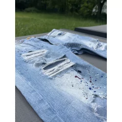 Jeans à trou peinture 